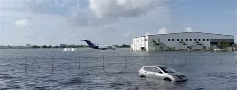 Photos: Wind and rain pound South Florida, major flooding closes roads, airport